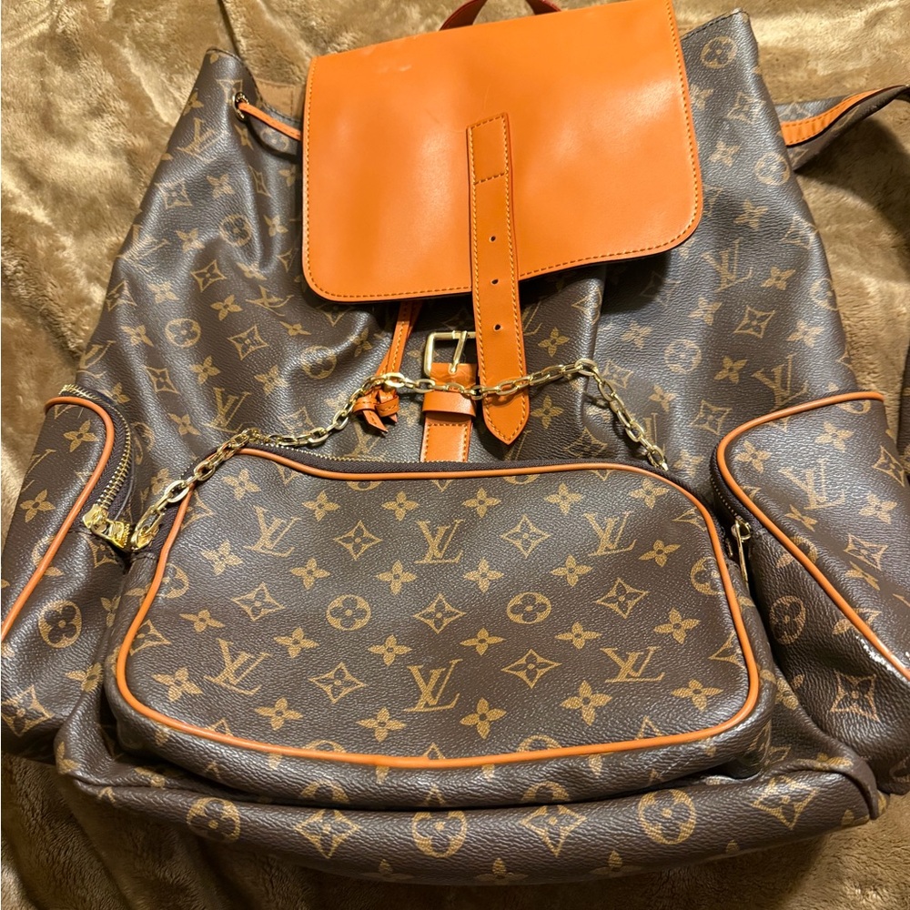Monogram Canvas Backpack with Orange Trim